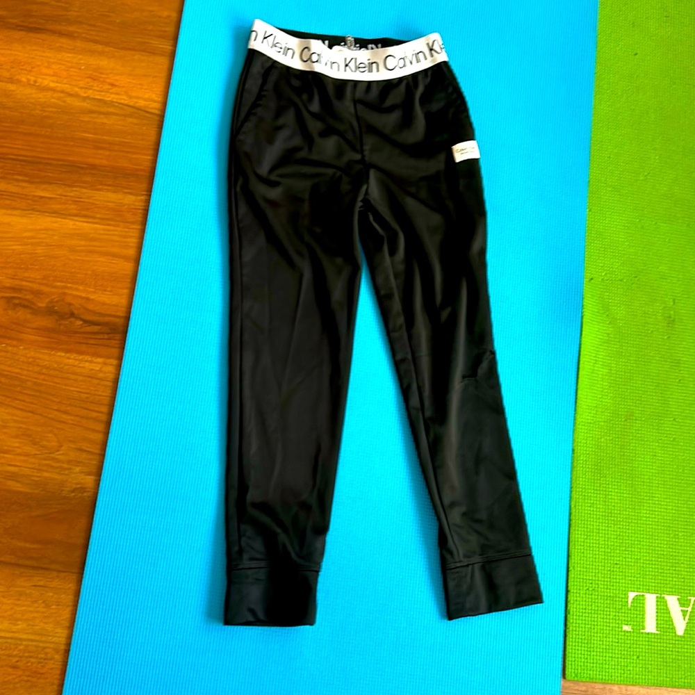 Calvin Klein two pocket in front athletic pants for ages 8-10 (M).
